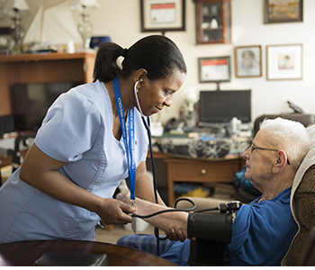 Lady checking blood pressure