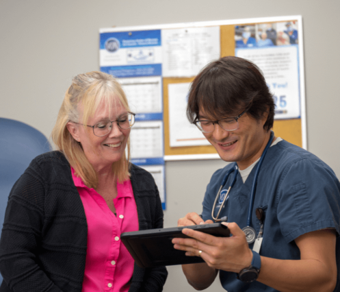 client and nurse look at von connect app together
