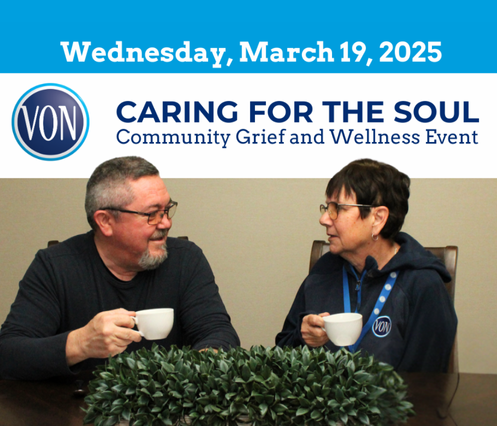 Two people, gentleman on the left and women on the right, sitting at a table, both holding a teacup having a dicussion. 
