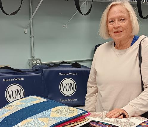 Wendy delivering quilts to VON