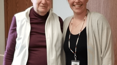 photo of Marybelle next to our volunteer coordinator, both smiling