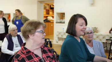 Group of women enjoying a sing-a-long
