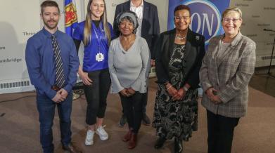 VON team poses with community members and government leaders at announcement