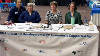 Group of VON staff at table