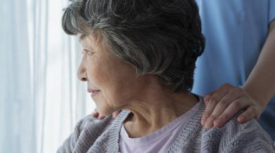 women looking out window