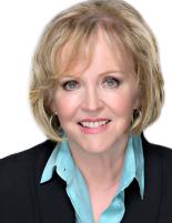 Headshot image of Jo-Anne Poirier wearing a turquoise blouse and black blazer 